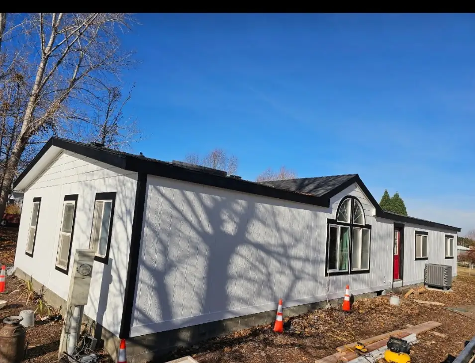 After: full home exterior with new siding
